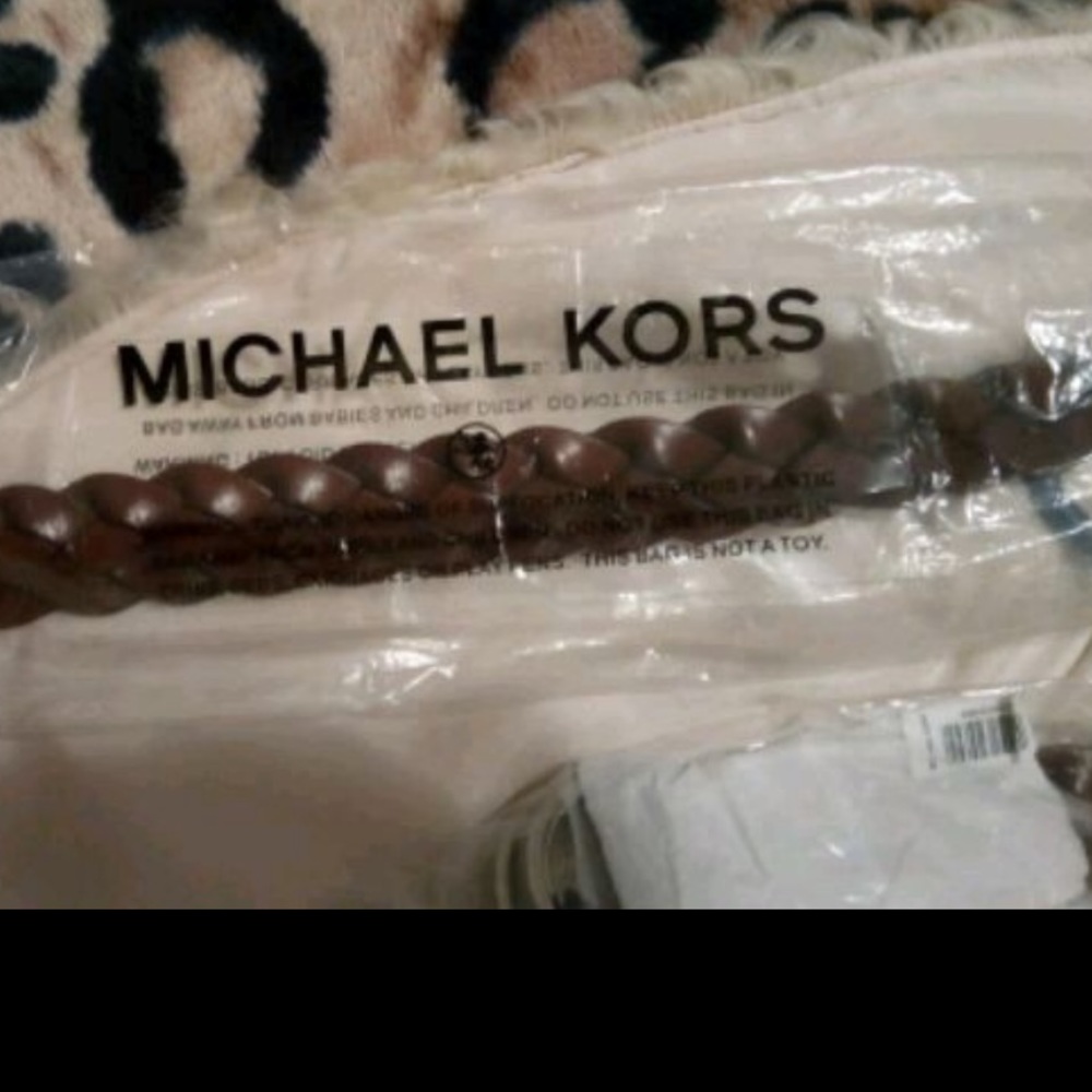 Michael Kors braided leather belt.